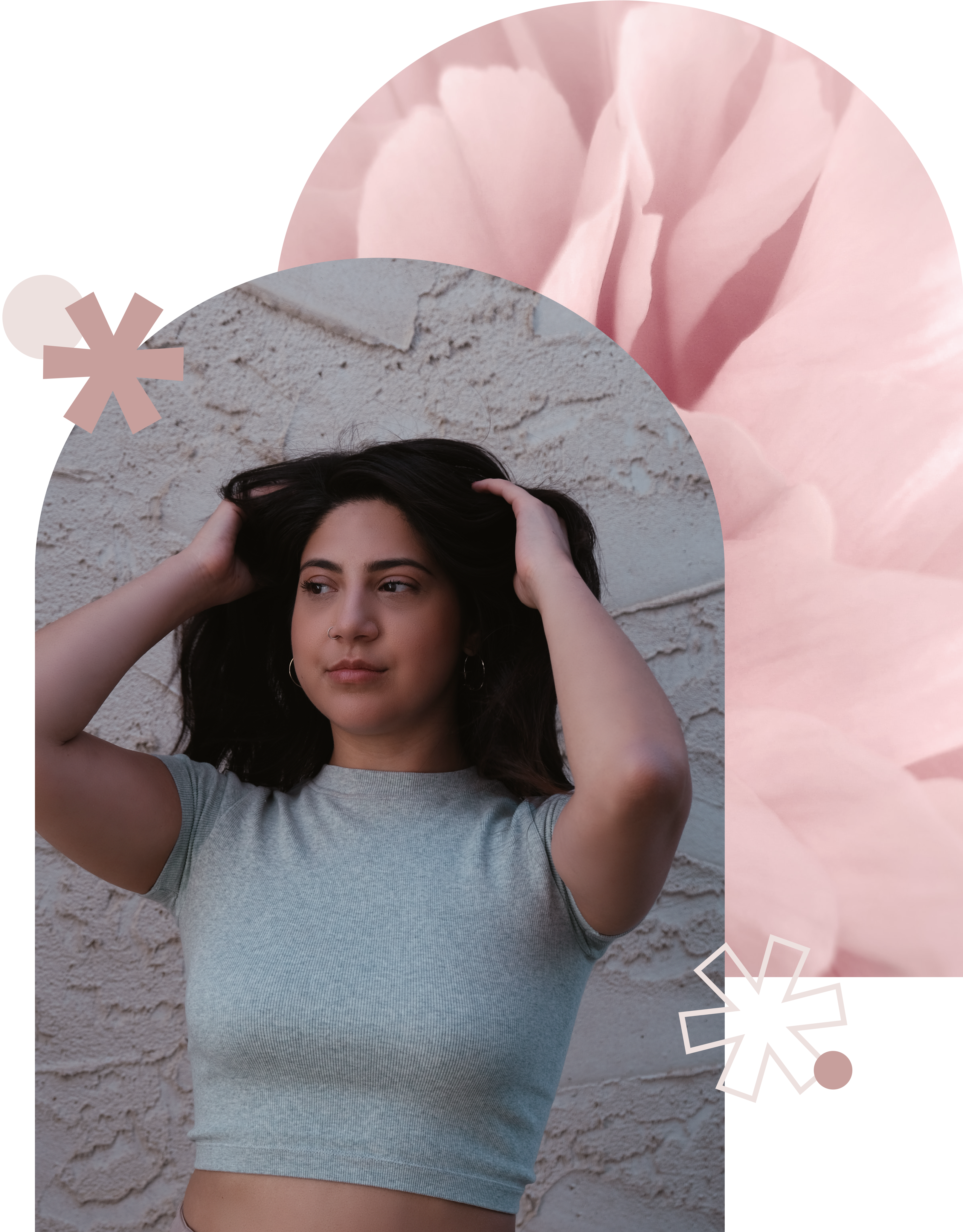 Woman posing with an image of a pink flower behind her